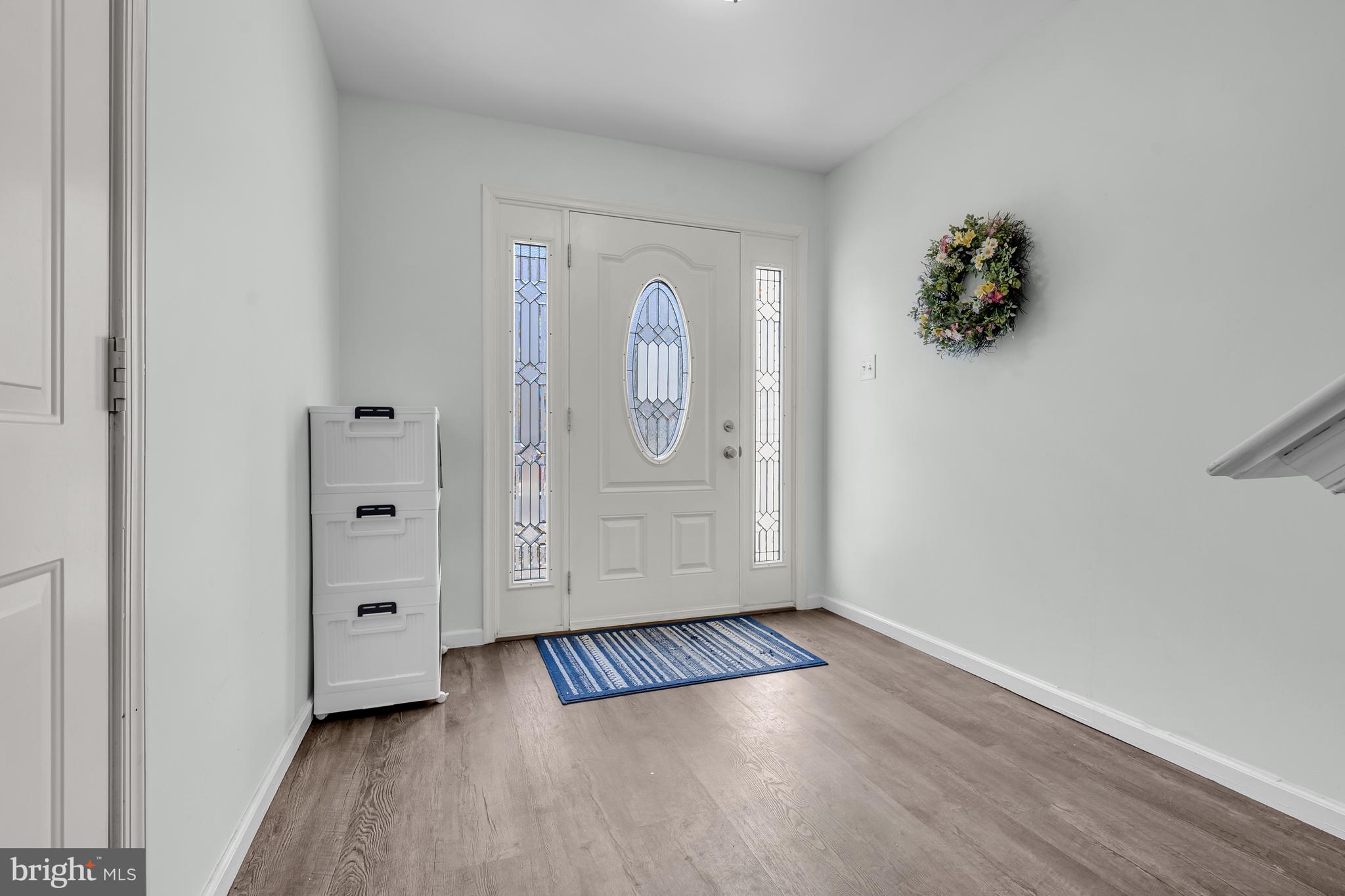 43 Wicklow Road Bear, DE 19701 - Photo 6 of 37 an empty room with mirror and door