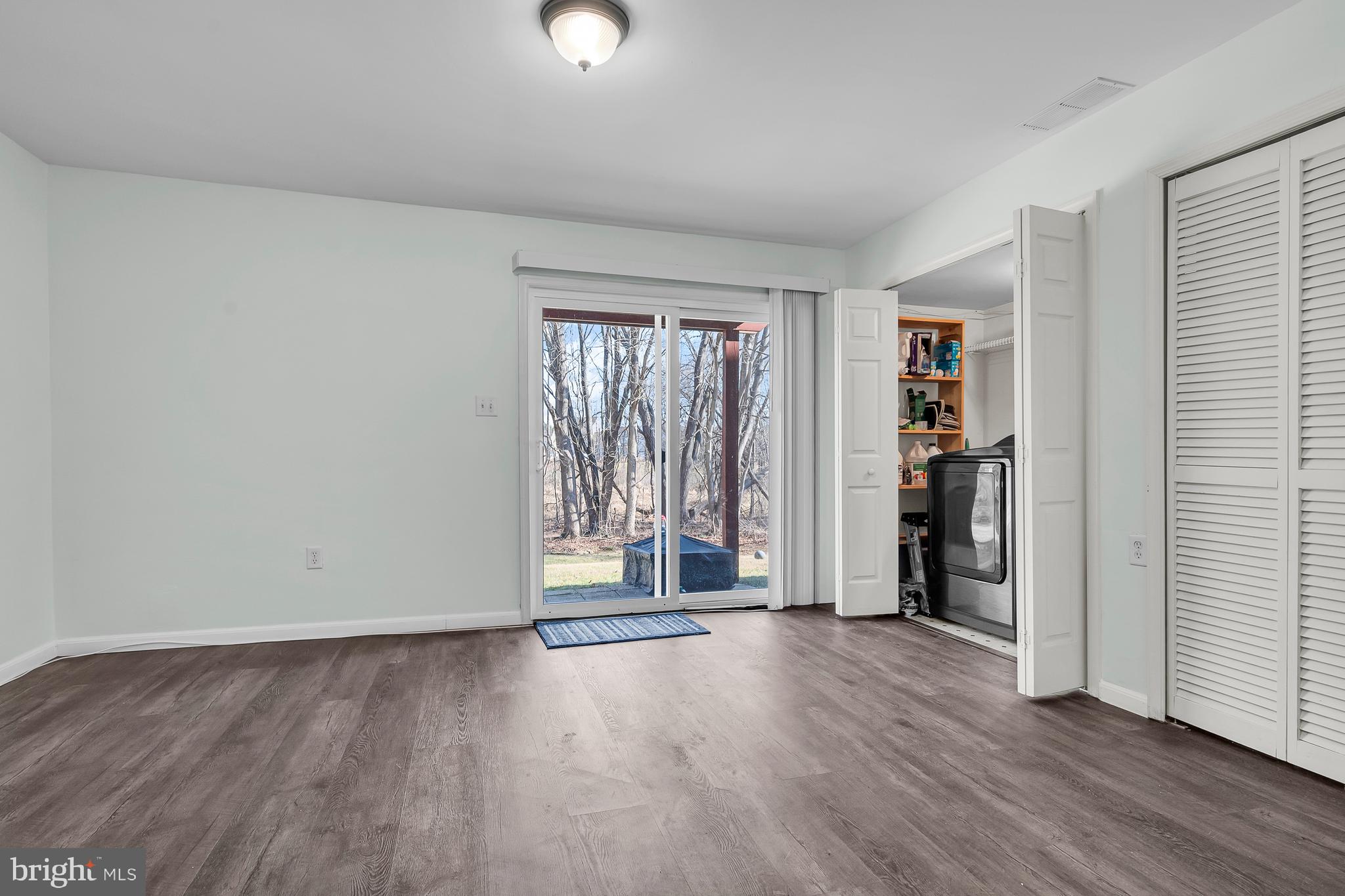 43 Wicklow Road Bear, DE 19701 - Photo 7 of 37 an empty room with wooden floor and closet