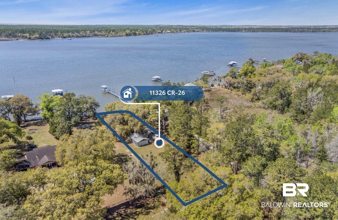 11326 County Road 26 Foley, AL 36535 - Photo 3 of 20 Aerial view of property's location with property parcel outlined and a large body of water