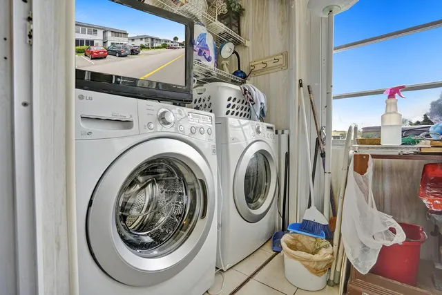 a view of a room with washer and dryer