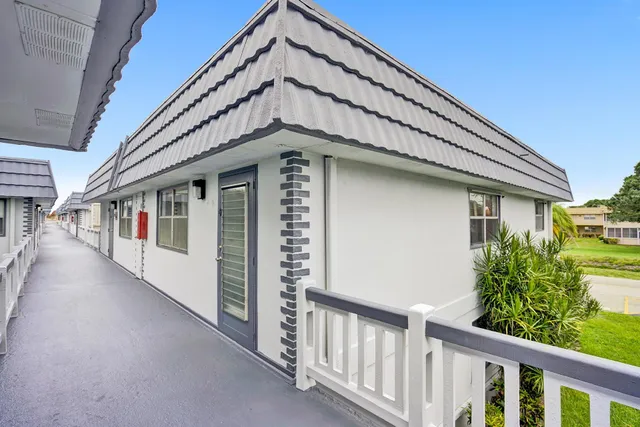 a front view of a house with balcony