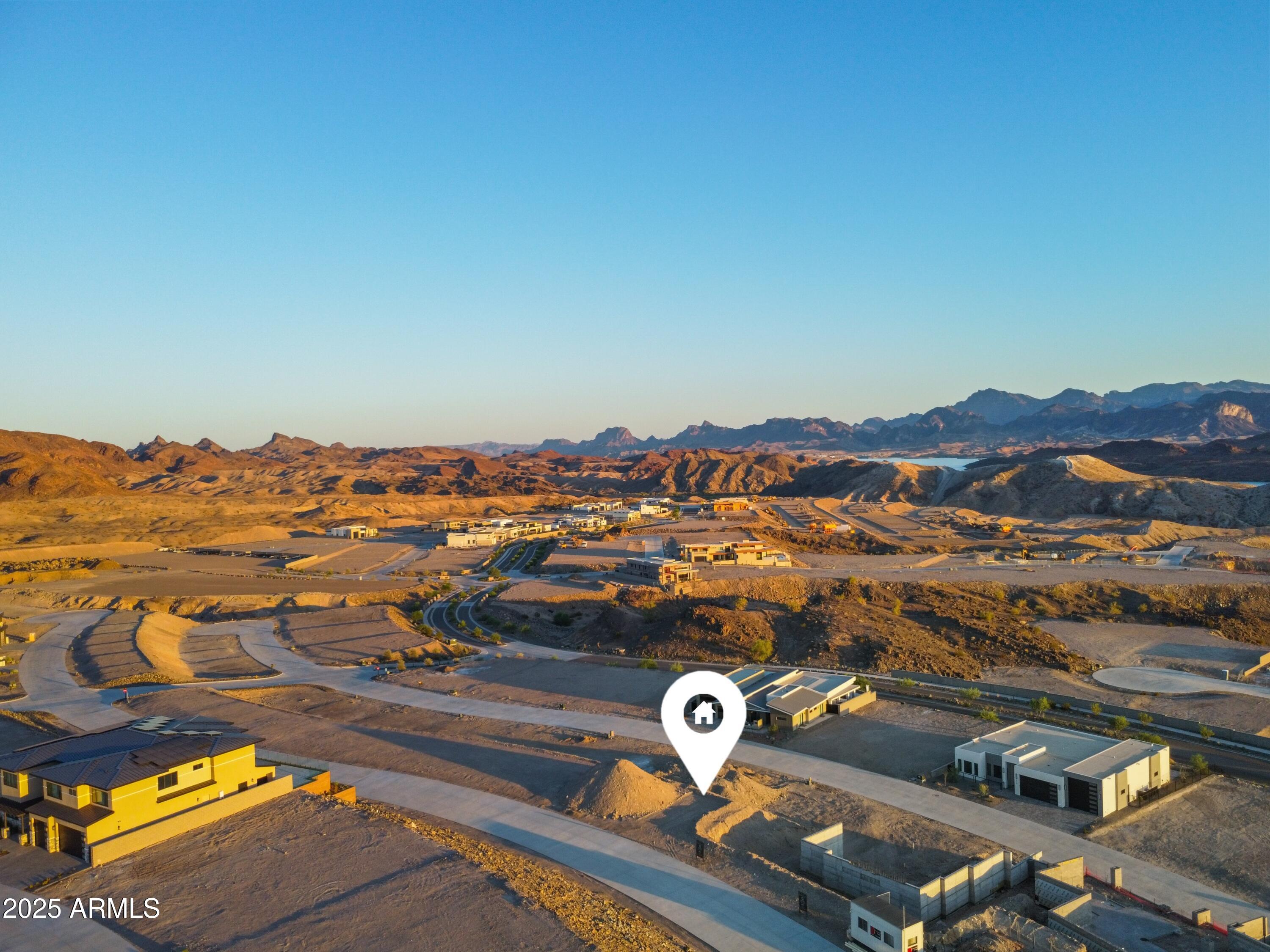 2408 Desert Ridge West, Unit 20 Lake Havasu City, AZ 86406 - Photo 2 of 9 an aerial view of residential houses with outdoor space