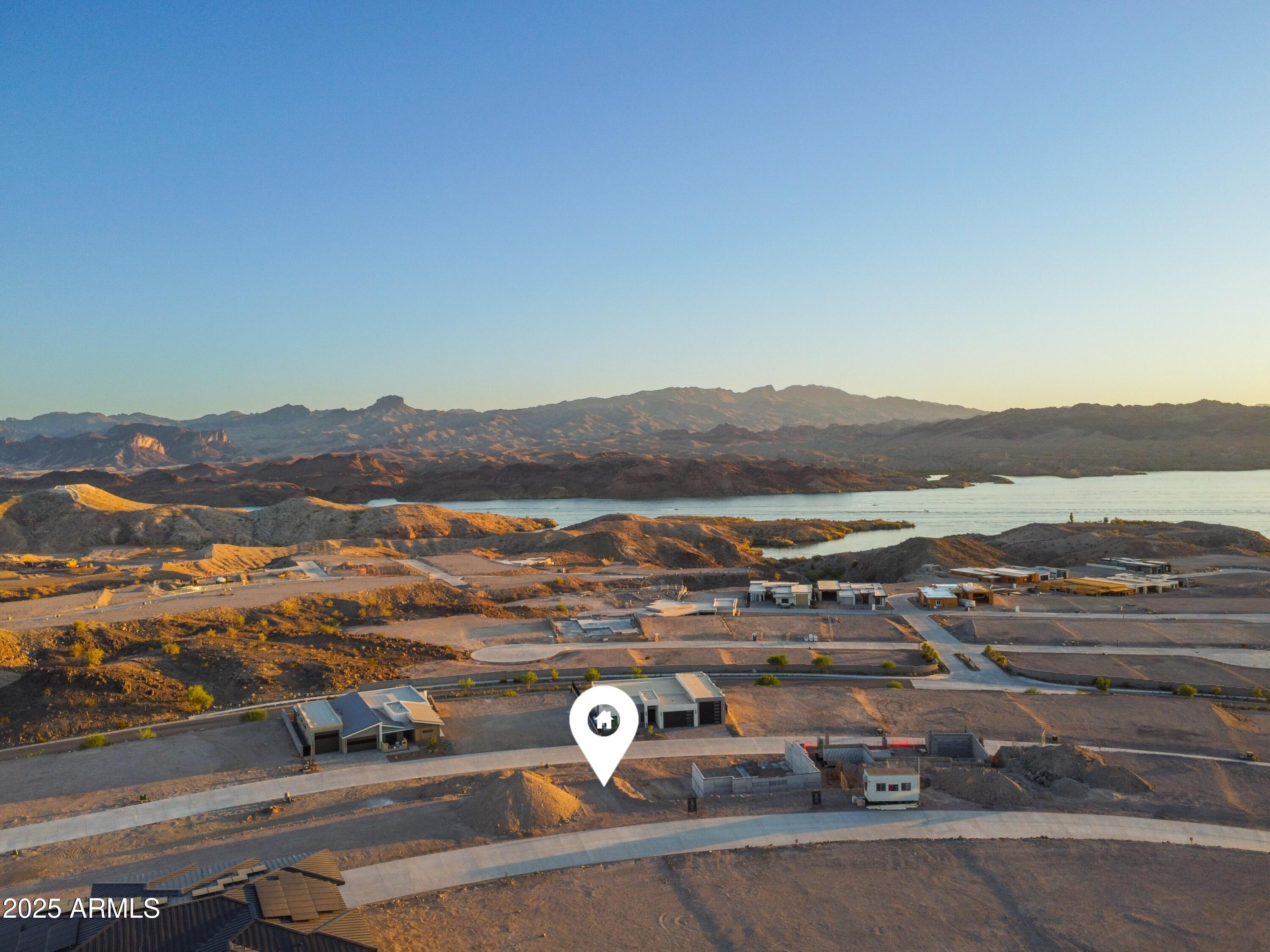 2408 Desert Ridge West, Unit 20 Lake Havasu City, AZ 86406 - Photo 3 of 9 an aerial view of residential houses with outdoor space