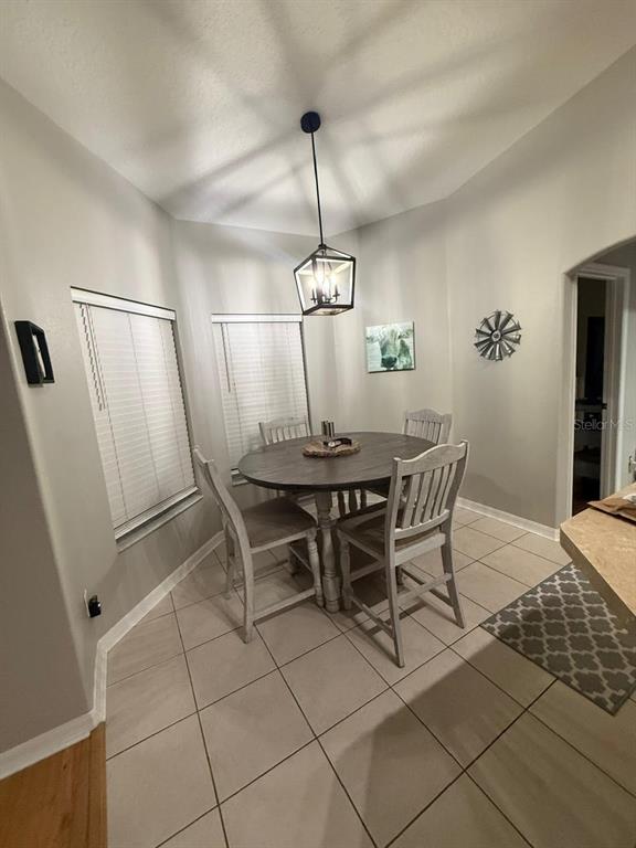 41430 Roger Giles Road Umatilla, FL 32784 - Photo 14 of 27 a dining room with furniture and window
