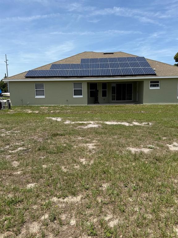 41430 Roger Giles Road Umatilla, FL 32784 - Photo 6 of 27 a view of a house with a yard