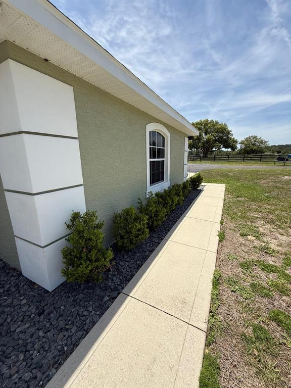 41430 Roger Giles Road Umatilla, FL 32784 - Photo 10 of 27 a house with a yard