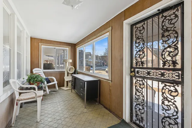 a living room with furniture and windows