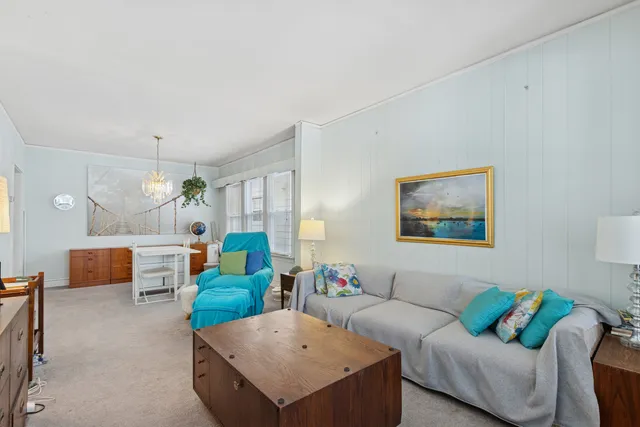 a living room with furniture and a couch