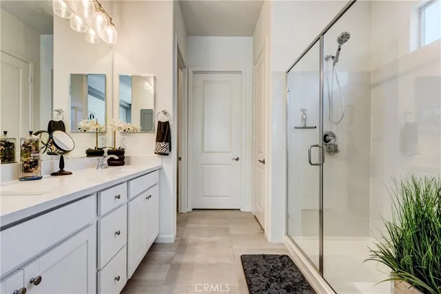 a view of a patio with table and chairs with wooden floor and a fireplace