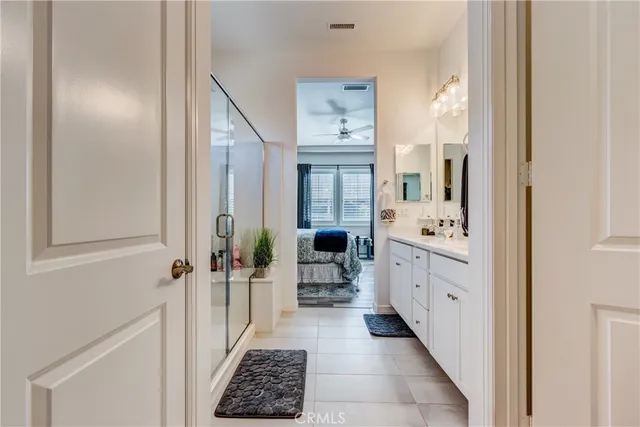 a view of a porch with furniture and a yard