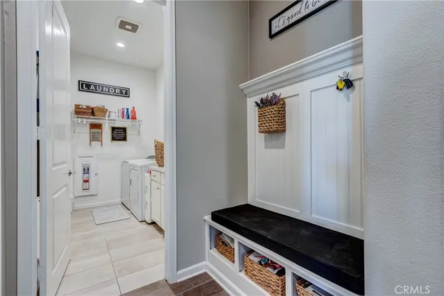 a view of a patio with table and chairs a barbeque