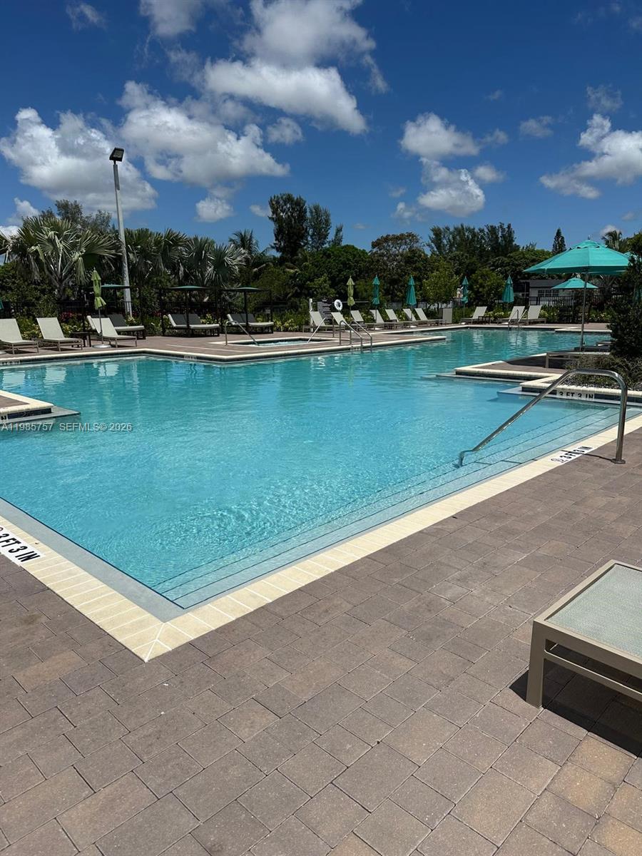 12221 Northwest 23rd Place Miami, FL 33167 - Photo 14 of 17 a view of a lake