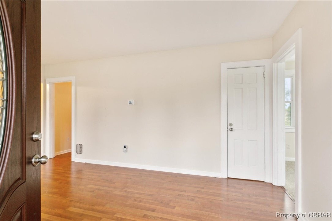 345 Fox Hill Road Hampton, VA 23669 - Photo 5 of 46 Entrance foyer with visible vents, baseboards, and light wood-style floors