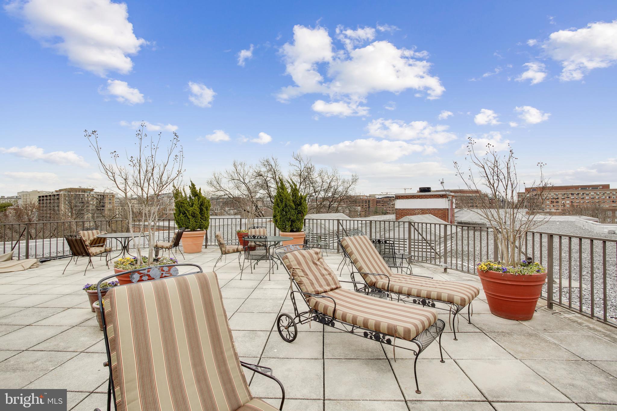 2500 Q Street Northwest, Unit 201 Washington, DC 20007 - Photo 15 of 36 a view of a terrace with furniture
