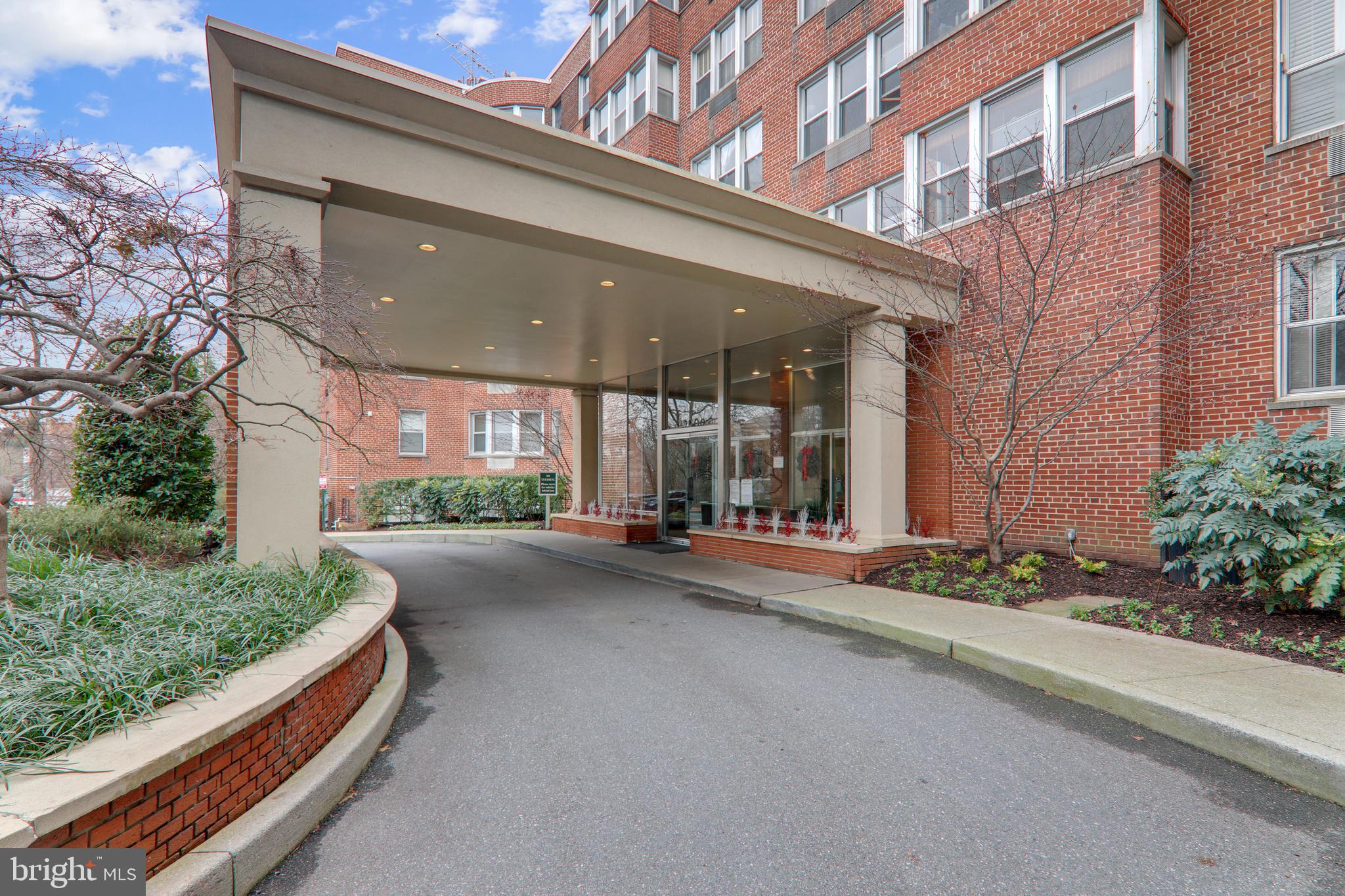2500 Q Street Northwest, Unit 201 Washington, DC 20007 - Photo 2 of 36 a view of a building along with street