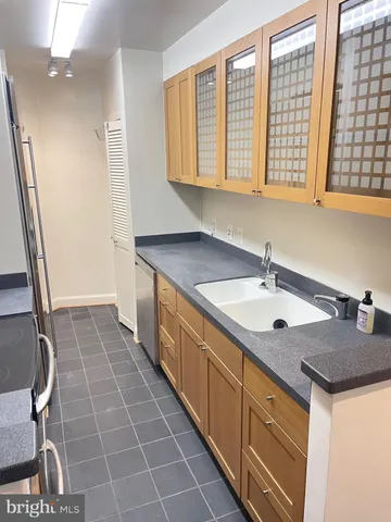 a kitchen with a stove and a microwave