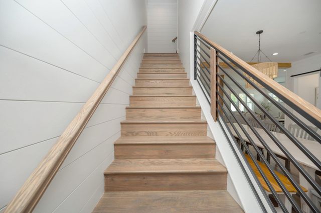 a bathroom with a double vanity sink and mirror