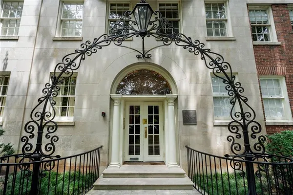 a view of a door with a fountain