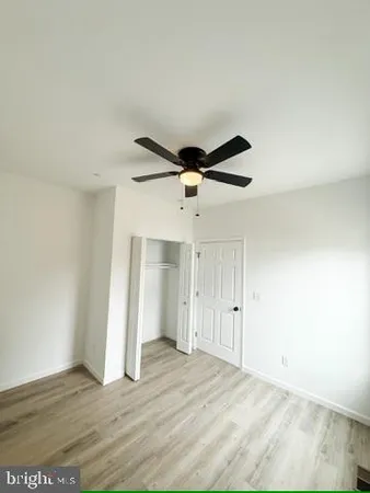 a kitchen with stainless steel appliances granite countertop a stove and a microwave