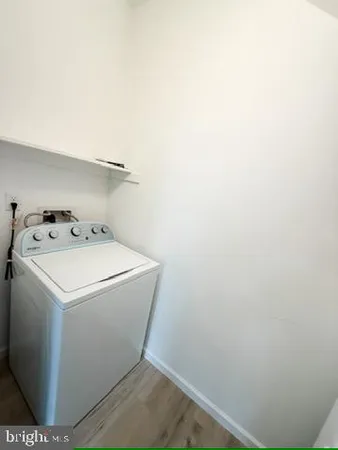 a bathroom with a shower and a toilet