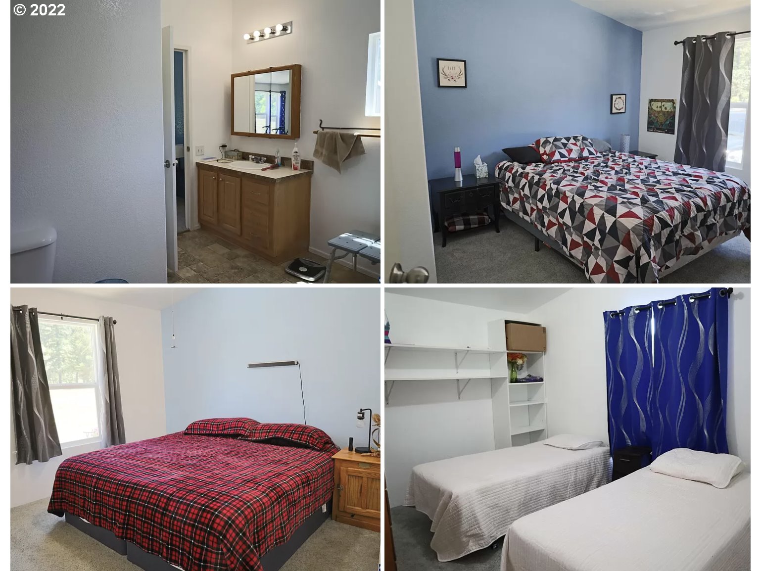 6515 Nonpareil Road Sutherlin, OR 97479 - Photo 8 of 14 a bedroom with a bed and a view of bathroom