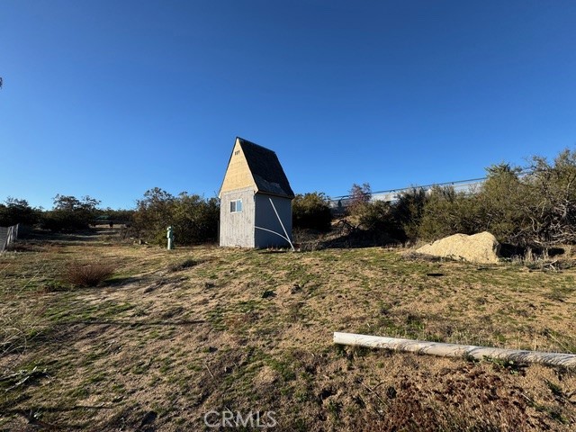 54740 Cave Rock Road Anza, CA 92539 - Photo 41 of 47 a view of a house with a yard
