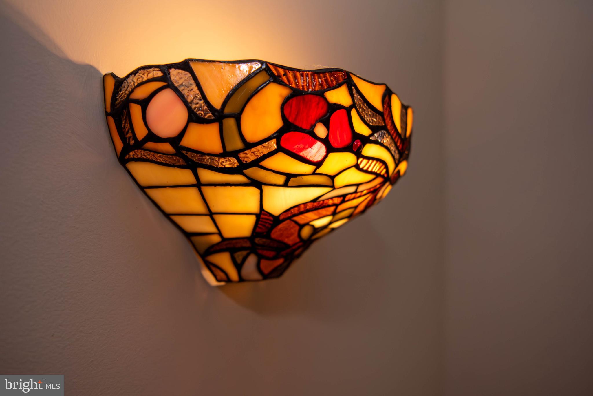 792 Forest Glen Road Moorefield, WV 26836 - Photo 108 of 146 Stunning stained glass wall sconce.