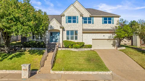 front view of house with a yard