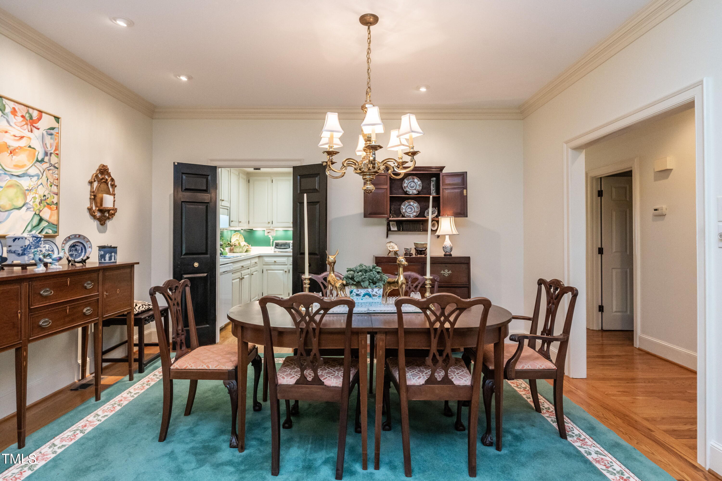 3341 Ridgecrest Court Raleigh, NC 27607 - Photo 5 of 26 a view of a dining room with furniture and wooden floor