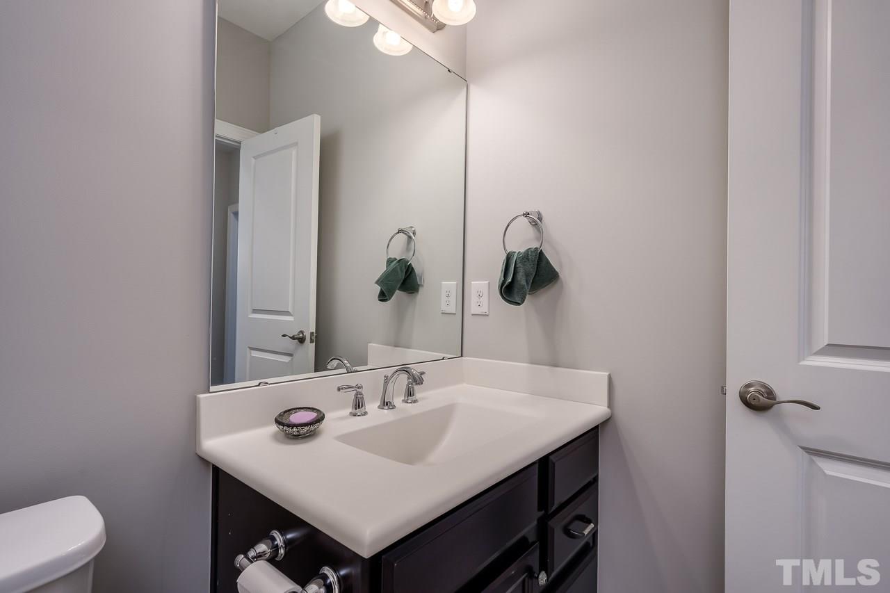 3608 Julia Lane Raleigh, NC 27609 - Photo 16 of 30 a bathroom with a sink and a toilet