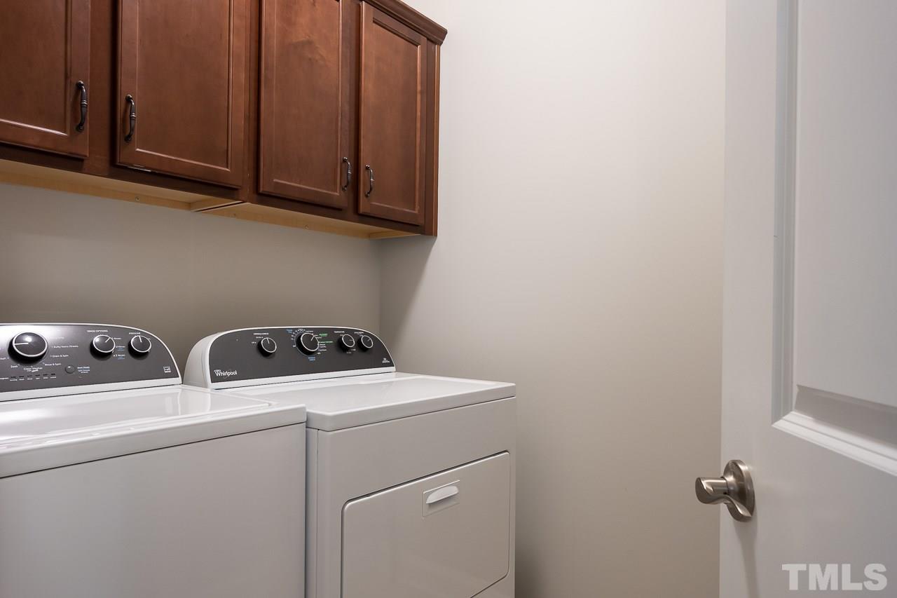 3608 Julia Lane Raleigh, NC 27609 - Photo 24 of 30 a utility room with dryer and washer