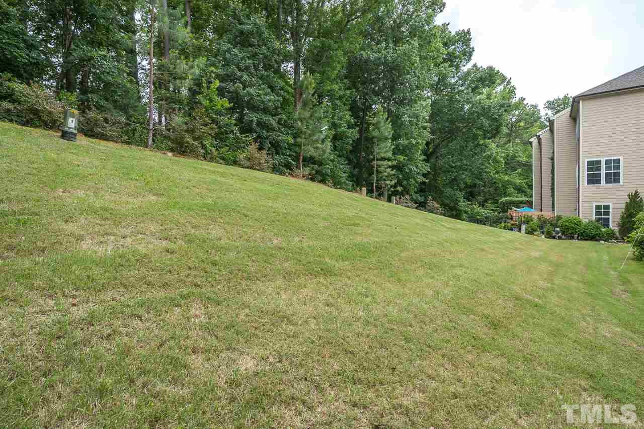 3608 Julia Lane Raleigh, NC 27609 - Photo 28 of 30 a view of a field with trees in the background