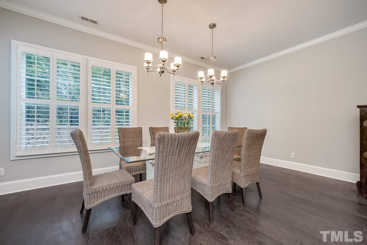 3608 Julia Lane Raleigh, NC 27609 - Photo 5 of 30 a view of a dining room with furniture window and wooden floor