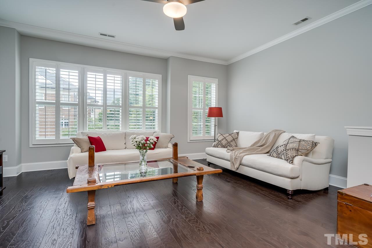 3608 Julia Lane Raleigh, NC 27609 - Photo 7 of 30 a living room with furniture and wooden floor