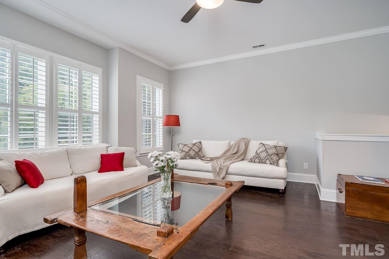 3608 Julia Lane Raleigh, NC 27609 - Photo 8 of 30 a living room with furniture and a large window