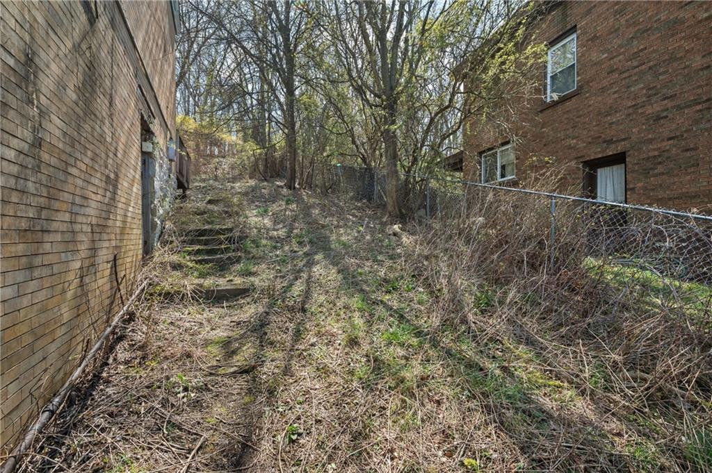1339 Romanhoff Street Pittsburgh, PA 15212 - Photo 26 of 30 a backyard of a house with lots of green space