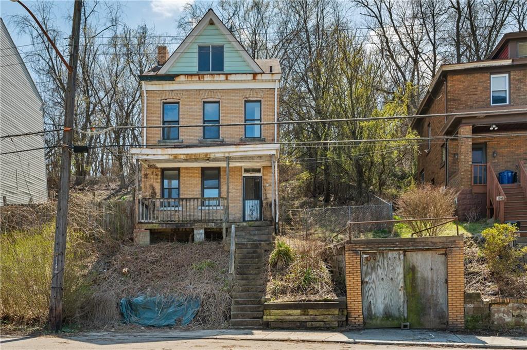 1339 Romanhoff Street Pittsburgh, PA 15212 - Photo 28 of 30 a front view of a house with glass windows