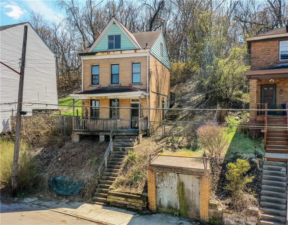 1339 Romanhoff Street Pittsburgh, PA 15212 - Photo 6 of 30 a view of a house with a yard