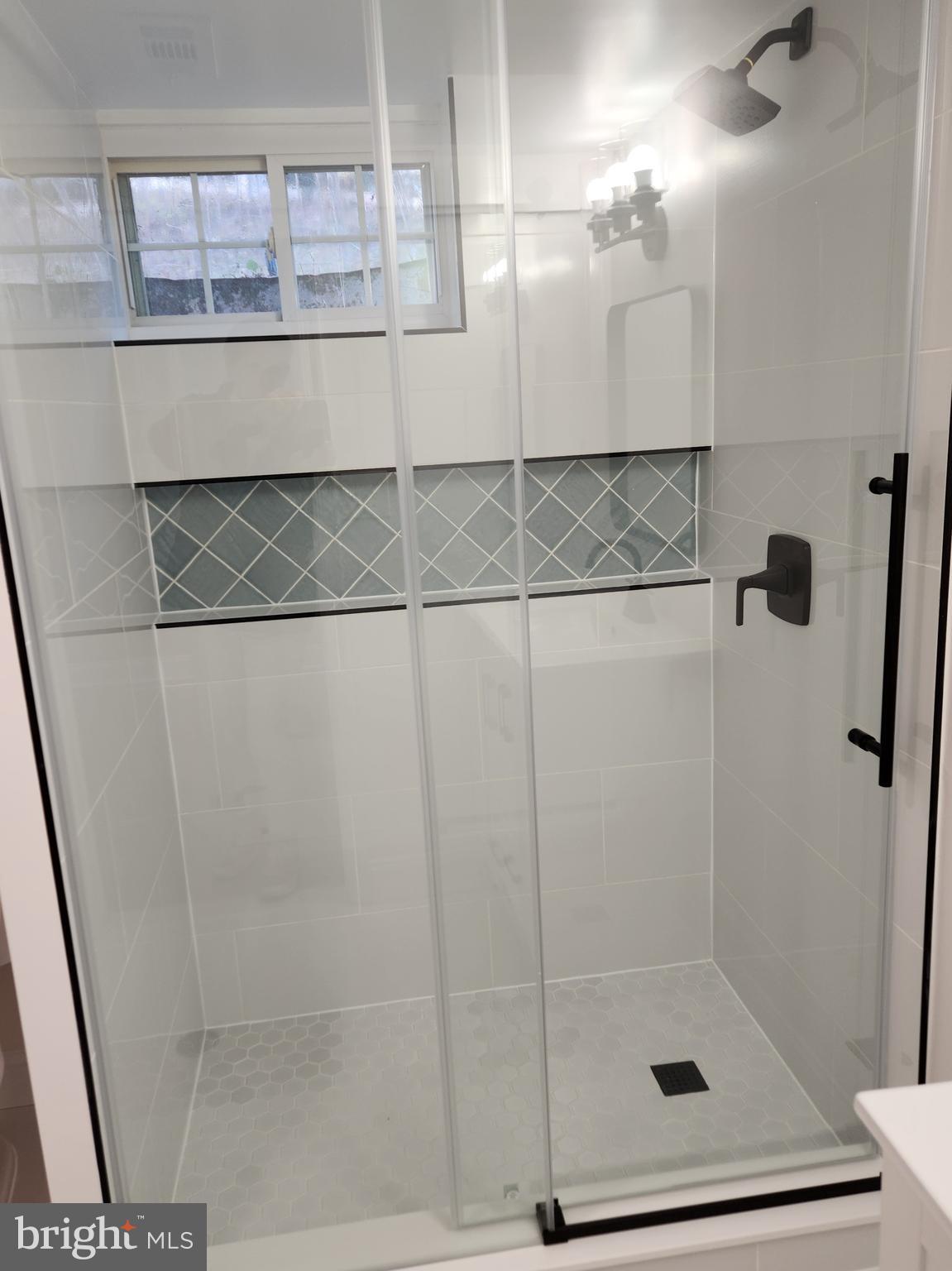 502 East Schuyler Road Silver Spring, MD 20901 - Photo 21 of 38 a bathroom with a shower