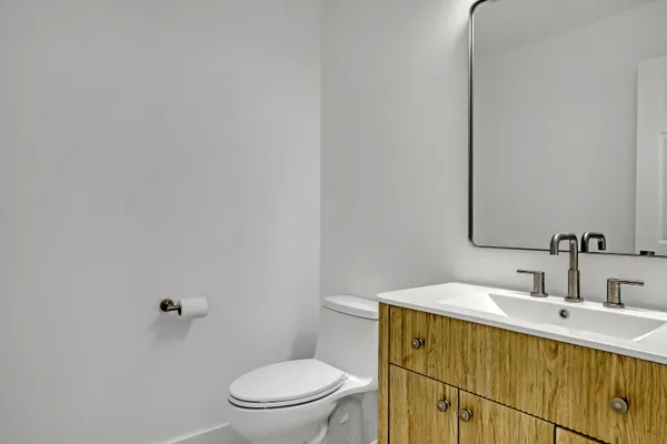 a view of an empty room with a chandelier