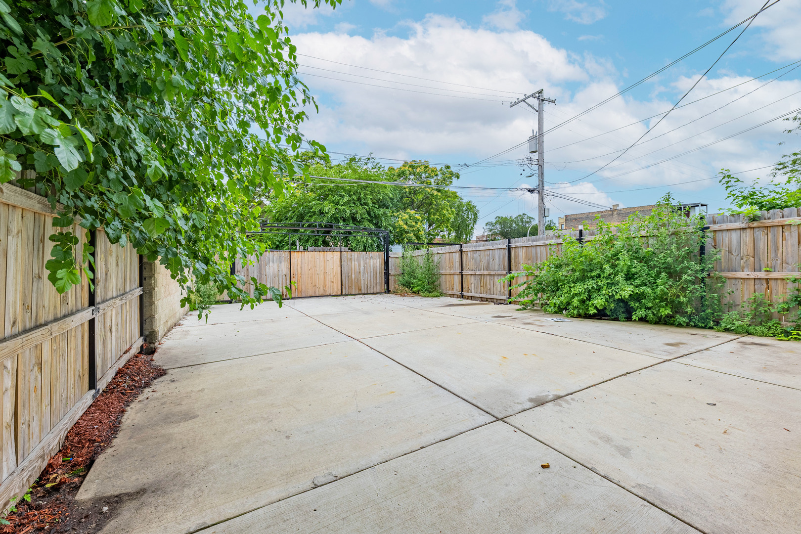 4453 West Adams Street Chicago, IL 60624 - Photo 31 of 32 a view of a house with a street