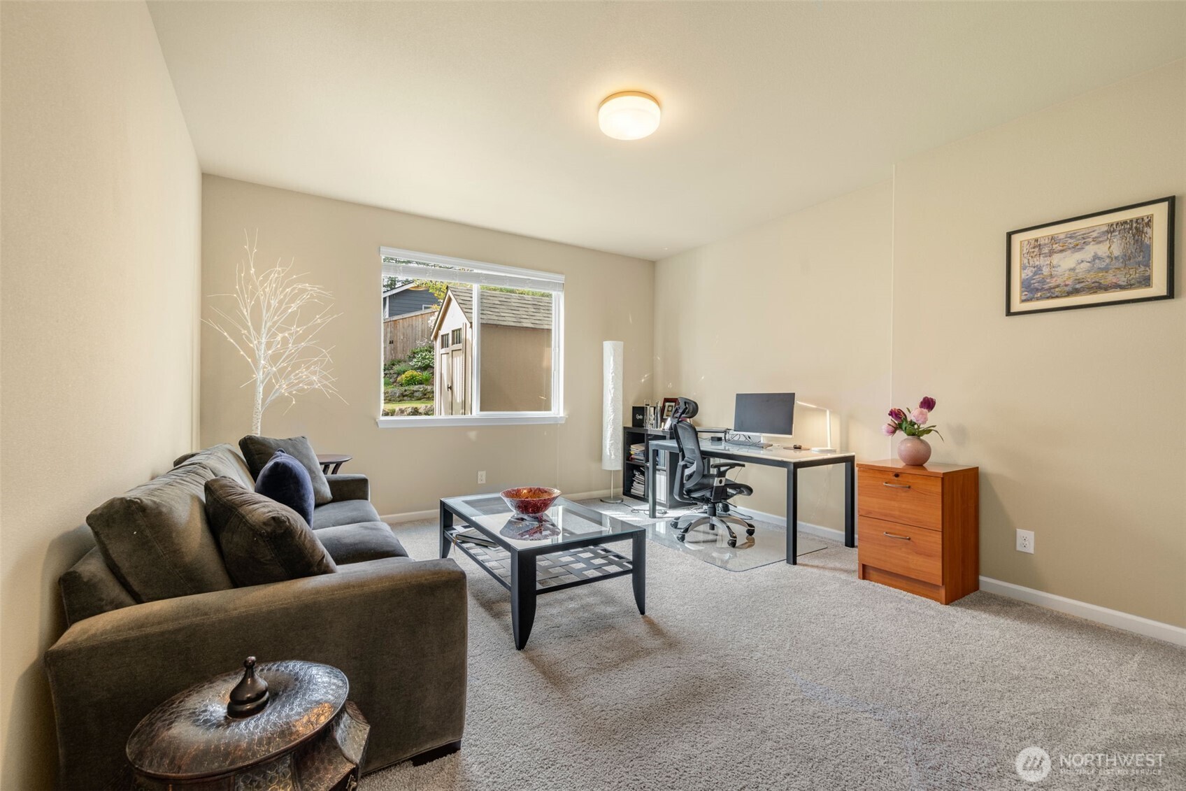 216 178th Street Southeast Bothell, WA 98012 - Photo 34 of 40 a living room with furniture and a dining area