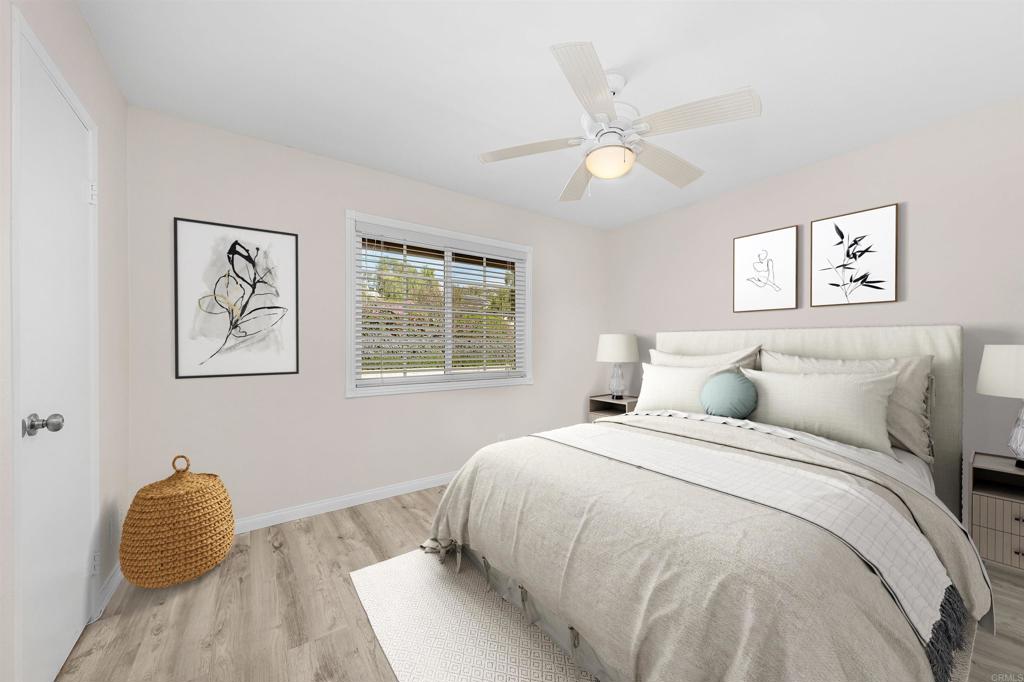 2073 Valley Rim Road El Cajon, CA 92019 - Photo 21 of 33 a bedroom with a bed and painting on the wall