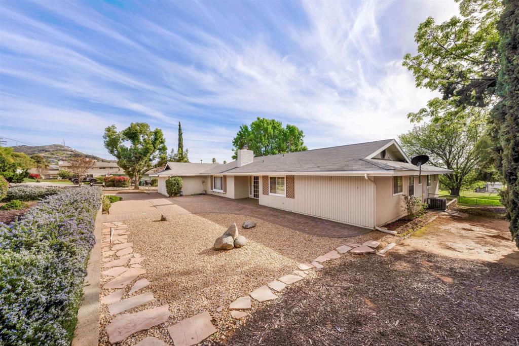 2073 Valley Rim Road El Cajon, CA 92019 - Photo 25 of 33 a view of a house with a yard
