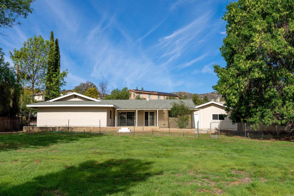 2073 Valley Rim Road El Cajon, CA 92019 - Photo 29 of 33 a front view of a house with a garden
