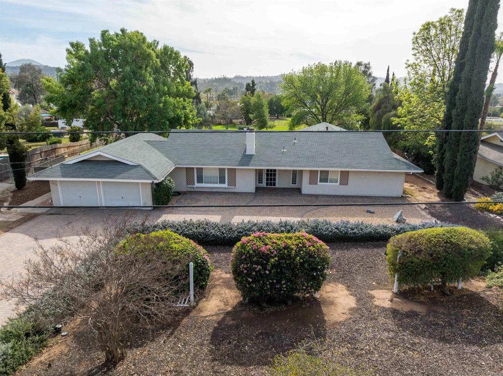 2073 Valley Rim Road El Cajon, CA 92019 - Photo 32 of 33 an aerial view of a house with swimming pool and big yard