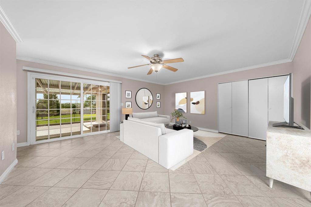 2073 Valley Rim Road El Cajon, CA 92019 - Photo 6 of 33 a view of a kitchen with a sink and a living room filled with furniture
