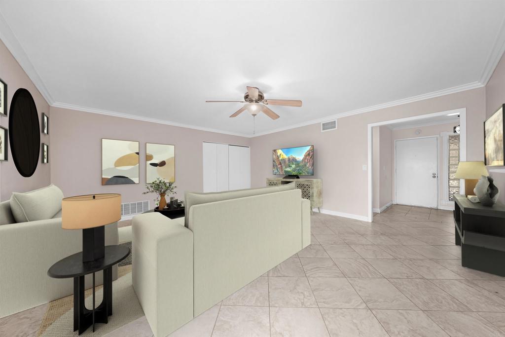 2073 Valley Rim Road El Cajon, CA 92019 - Photo 7 of 33 a living room with furniture and a chandelier