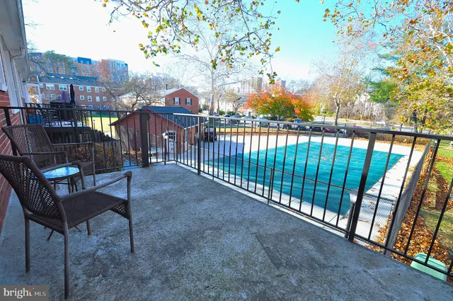 a view of a balcony with city view