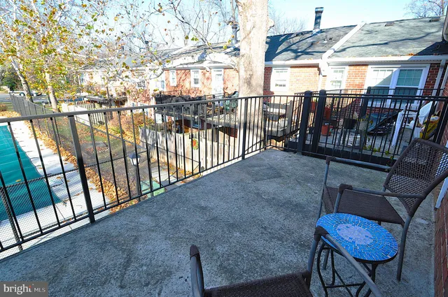 a view of entryway with wooden stairs